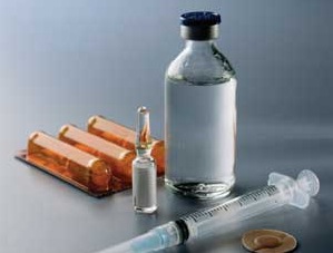 insulin syringes and bottle