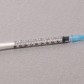A thin syringe with an exposed needle containing a dosage of Marqibo.