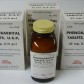 A brown Phenobarbital bottle surrounded by packages that all contain 32 mg dosages.