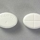 The front and back of a 4 mg Medrol tablet.