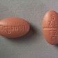 The front and back of a 30 mg Remeron tablet.
