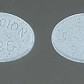 Front and back of a .25 mg Halcion tablet